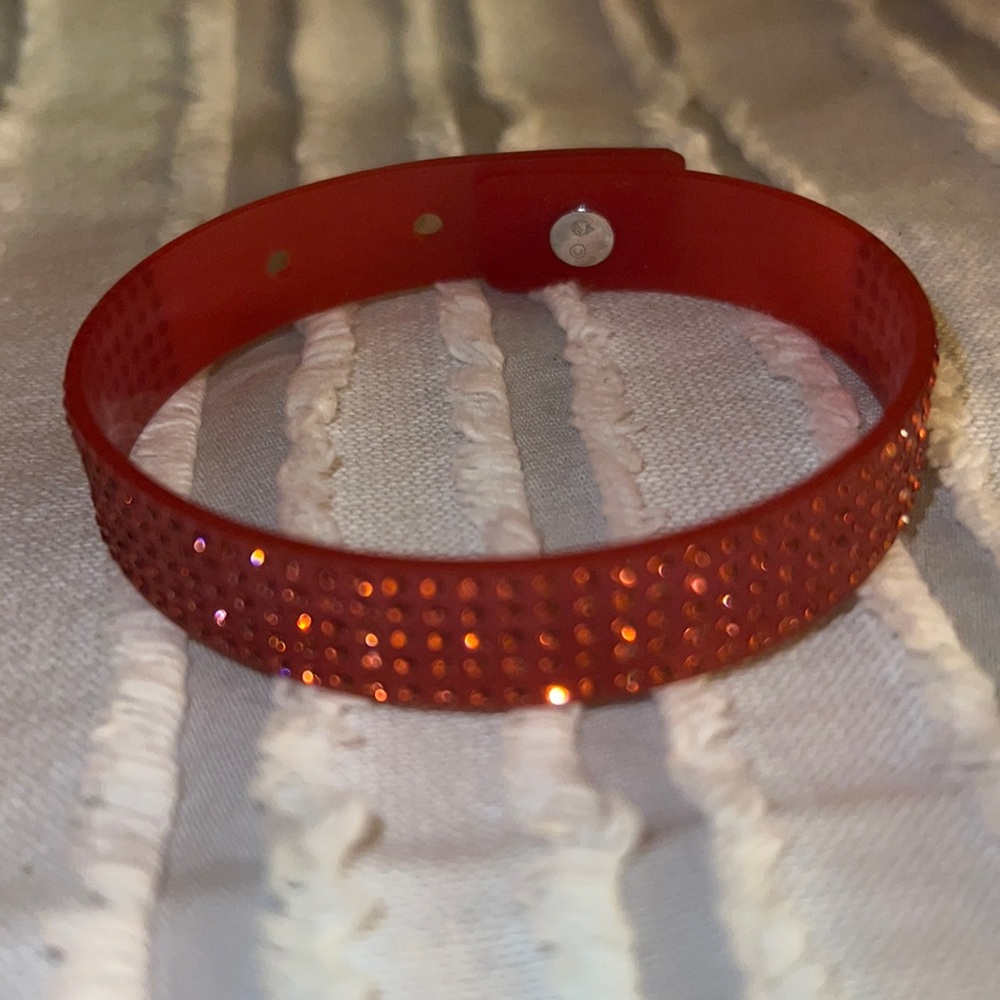 Pink adjustable rubber cuff